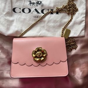 Coach mini bower crossbody bag with tea rose turnlock closure